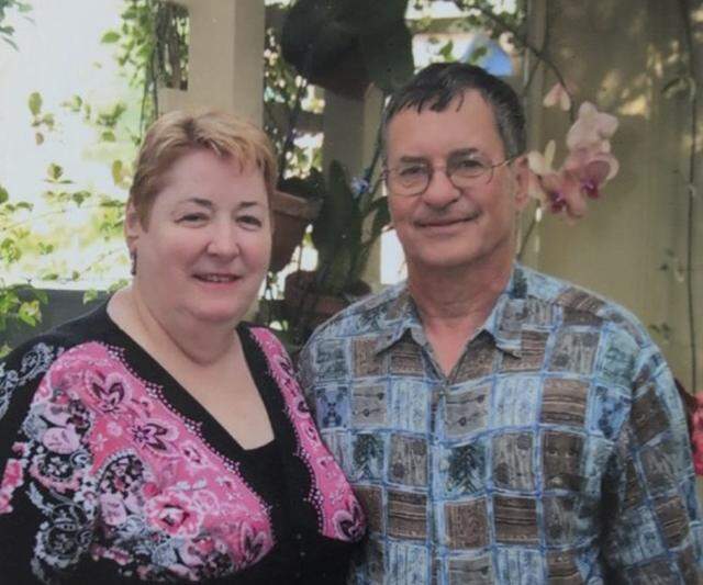 Darrell Schroll, pictured here with his wife, contracted a serious infection caused by a bacteria called M. chimaera after having open-heart surgery in 2019 at The University of Kansas Hospital. He died on July 26, 2023, at 74. A series of lawsuits allege that the bacteria was spread from contaminated heater-cooler devices used during the surgeries.